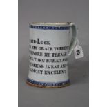 A LATE 18TH CENTURY ENGLISH TIN GLAZE EARTHENWARE TANKARD, blue and white geometric bands to top and
