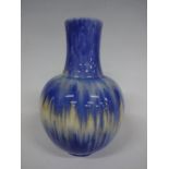 A RUSKIN POTTERY BULBOUS VASE, having flared long neck, in blue and green tonal enamels, impressed