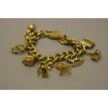 A LATE 20TH CENTURY 9CT GOLD CURB LINK CHARM BRACELET, together with assorted 9ct gold charms,