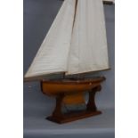 A LARGE MID 20TH CENTURY PLANK BUILT MODEL YACHT, 'Cresta', with metal parts stamped 'Metcalf',