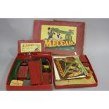 A QUANTITY OF MECCANO, contained in a damaged set no. 7 box, red and green era items, includes