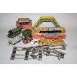 AN UNBOXED HORNBY O GAUGE CLOCKWORK NO. 0 LOCOMOTIVE, no. 4797, L.N.E.R green livery, complete