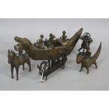 TRIBAL ART, four African Ashanti style metal figure groups, comprising figures in a dragon boat,