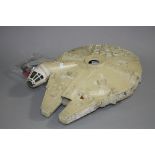 AN UNBOXED KENNER STAR WARS MILLENIUM FALCON, with some accessories, has some damage and missing