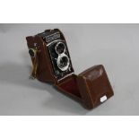 A ROLLEICORD VA TLR CAMERA, in it's original leather case, Serial No.1589066, fitted with