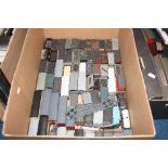 A QUANTITY OF UNBOXED AND ASSORTED OO GAUGE WAGONS, to include Airfix, Lima, Mainline, Wrenn,