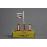 A BOXED DINKY TOYS PETROL PUMP STATION 'ESSO', No.781, very lightly playworn condition, some marks