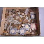 A BOX OF WORLD COINS AND COMMEMORATIVES
