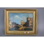 A GILT FRAMED OIL ON PANEL, Venetian river townscape with boats on river between buildings with