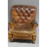 A BROWN LEATHER RECLINING CHAIR, having button back, scroll arm supports over turned front and