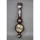 AN EARLY 19TH CENTURY MAHOGANY AND SATINWOOD BANDED WHEEL BAROMETER, by Angelo Carioli of Holmfirth,