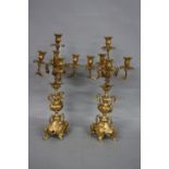 A PAIR OF 20TH CENTURY GILT SPELTER FIVE BRANCH CANDELABRA, of Victorian style, with holes drilled