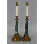 A PAIR OF 20TH CENTURY TABLE LAMPS, in the form of early 19th Century brass and green granite