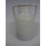 A RUSKIN POTTERY TWIN HIGH HANDLED VASE, in white and ochre crystalline glaze, impressed Ruskin,