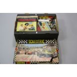A BOXED SCALEXTRIC MOTOR RACING SET, No.31, appears complete with both cars, blue Cooper, No.C66,