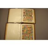 AN ALL WORLD COLLECTION OF STAMPS, in two albums