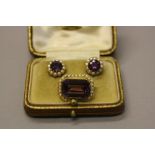 A LATE VICTORIAN AMETHYST AND SPLIT PEARL RECTANGULAR SHAPE BROOCH, emerald cut amethyst within a