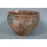 A RED TERRACOTTA BOWL, with incised decoration to the other border, from Palestine circa 3000BC,