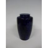 A RUSKIN POTTERY VASE, of shouldered ovoid form having cobalt blue souffle glaze rolled rim, incised