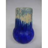 A RUSKIN POTTERY BULBOUS BODY LONG NECK VASE, having blue and white crystalline glaze, impressed