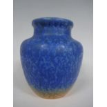 A RUSKIN POTTERY OVOID VASE, having collar neck with crystalline mottled blue glaze and orange tonal