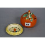 A CLARICE CLIFF BIZARRE ORANGE SHAPED AND DECORATED PRESERVE JAR, height approximately 9.5cm (s.d.),
