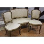 A THREE PIECE SALON SUITE, comprising settee and two chairs, all having gilt frames with floral