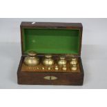 A GRADUATED SET OF THIRTEEN GEORGE IV BRASS SPECIAL WEIGHTS, by Bate of London, dated 1824, the