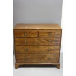 A 19TH CENTURY MAHOGANY CHEST OF DRAWERS, having two short over three graduated drawers, all with