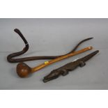 TRIBAL ART, a club with bulbous head, length approximately 55cm, together with a carved wooden
