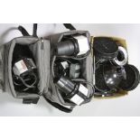 FOUR BOWEN TRAVELLER 3000GH FLASH HEADS, in two soft cases, including a quantity of Universal