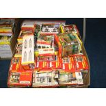 A QUANTITY OF BOXED HORNBY SKALEDALE ACCESSORIES, majority are urban houses, shops and structures