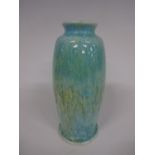 A RUSKIN POTTERY OVOID VASE, in crystalline blue and green glaze having circular foot and flared