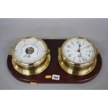 SEWILLS OF LIVERPOOL MODERN BRASS CASED QUARTZ SHIPS CLOCK AND ANEROID BAROMETER, mounted on a