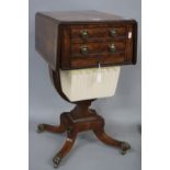 AN EARLY 19TH CENTURY MAHOGANY WORK TABLE, the drop-leaf crossbanded top above two drawers and