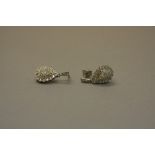 A MODERN PAIR OF WHITE GOLD AND DIAMOND PEAR SHAPE DROP EARRINGS, post and butterfly fittings,