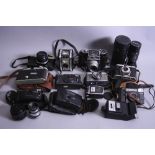 A BOX OF SLR FOLDING AND INSTANT CAMERAS, these include an Olympus PEN-EE, Pentax K1000, Agiflex