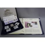 A WESTMINSTER BOX OF THE GOLDEN WEDDING ANNIVERSARY COLLECTION, with seven silver proofs with