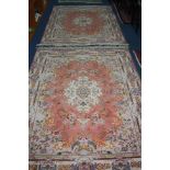 A PAIR OF LATE 20TH CENTURY SILK RUGS, pink and cream ground with foliate motifs, approximately