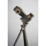A WWII ERA BRASS AND METAL CONTRUCTION TELESCOPE, bearing Number 14 Mk2 complete with tripod