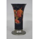 A WILLIAM MOORCROFT TUDRIC PEWTER BASED VASE, for Liberty & Co, Pomegranate design, having flared