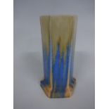 A RUSKIN POTTERY HEXAGONAL, STEPPED BASE VASE, having yellow, blue and orange drip crystalline glaze