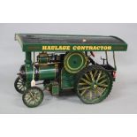 A SCRATCH BUILT (20TH CENTURY) WOODEN AND METAL STEAM ENGINE, green, black, red and yellow livery,