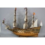A 20TH CENTURY WOODEN AND METAL MODEL OF 'SOVEREIGN OF THE SEAS', a 17th Century Warship with