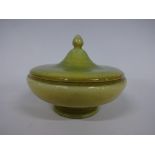 A RUSKIN POTTERY PEDESTAL POWDER BOWL AND COVER, having domed top with flame finial, decorated in