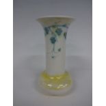 A RUSKIN POTTERY ONION VASE, with long flared neck having trailing vine and leaf decoration in green