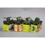 FOUR BOXED TELSALDA TOYS PLASTIC FRICTION DRIVE ARMOURED ROCKET LAUNCHER MODELS, one no. 323A, two