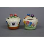 A CLARICE CLIFF BIZARRE CROCUS PATTERN PRESERVE POT AND COVER, another in Spring Crocus pattern,