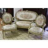 A THREE PIECE SALON SUITE, comprising settee and two armchairs, all having tapestry upholstery
