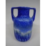 A RUSKIN POTTERY TWIN HANDLED VASE, having blue tonal crystalline glaze, impressed Ruskin, England